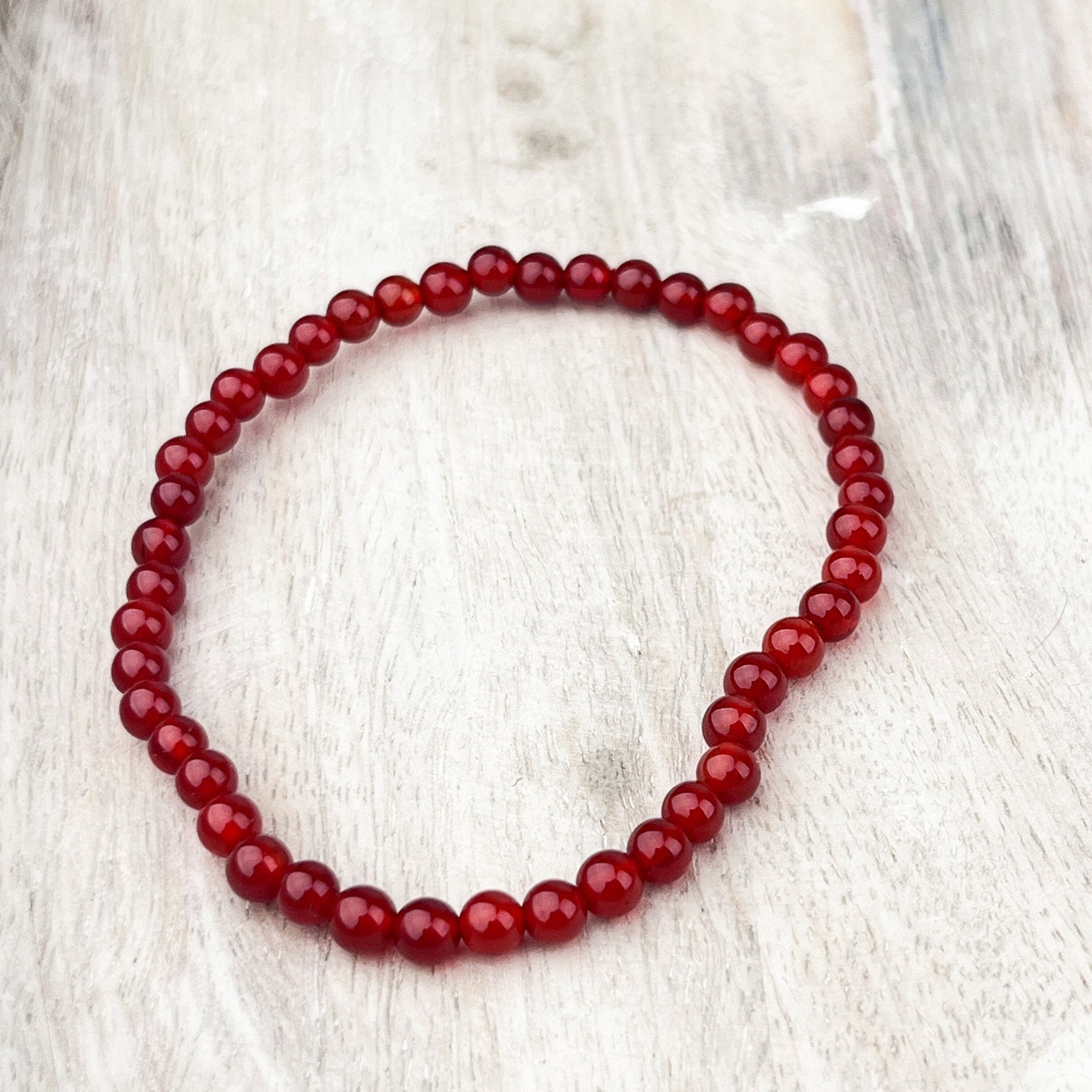 Vibrant Carnelian Gemstone Bracelet for Creativity and Confidence - 4mm Stone Beads, Elastic Band, 7.5 inches - Crystals for everyone • Crystals And Cord